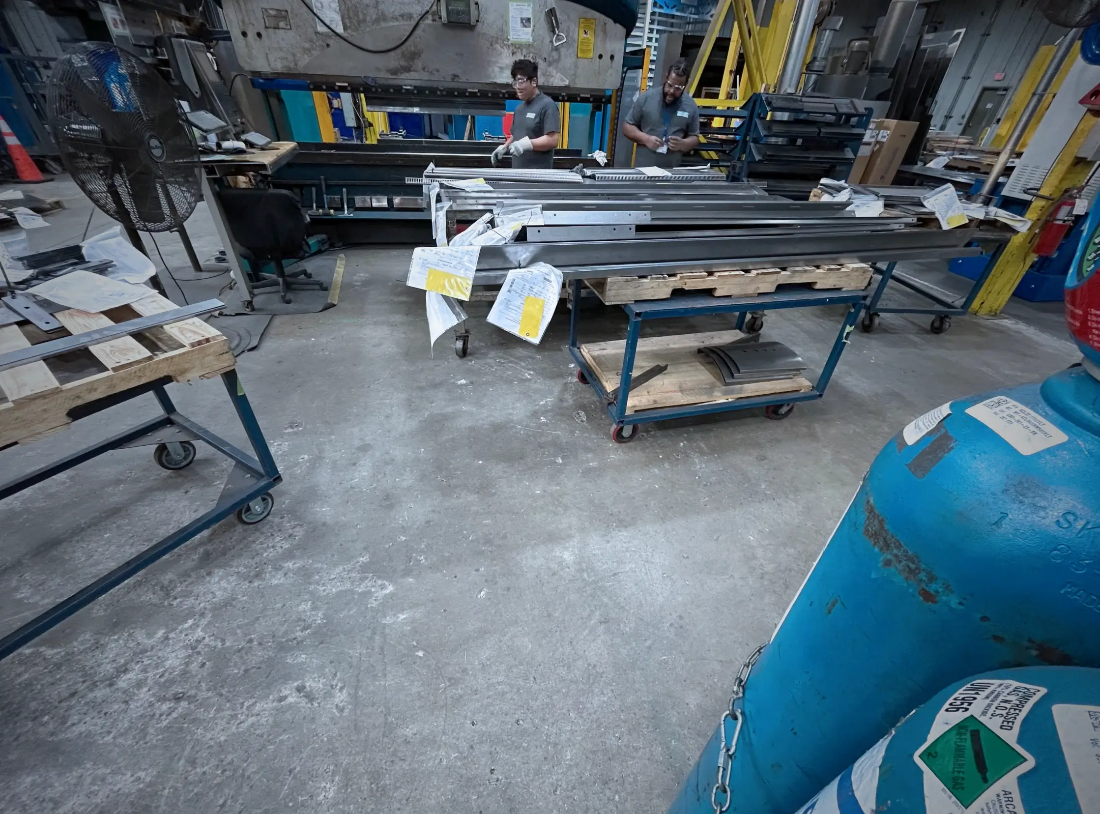 Disorganized metal fabrication shop