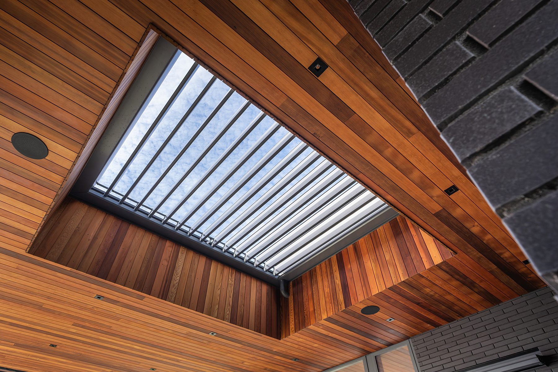 Detail of cedar soffit and louvre