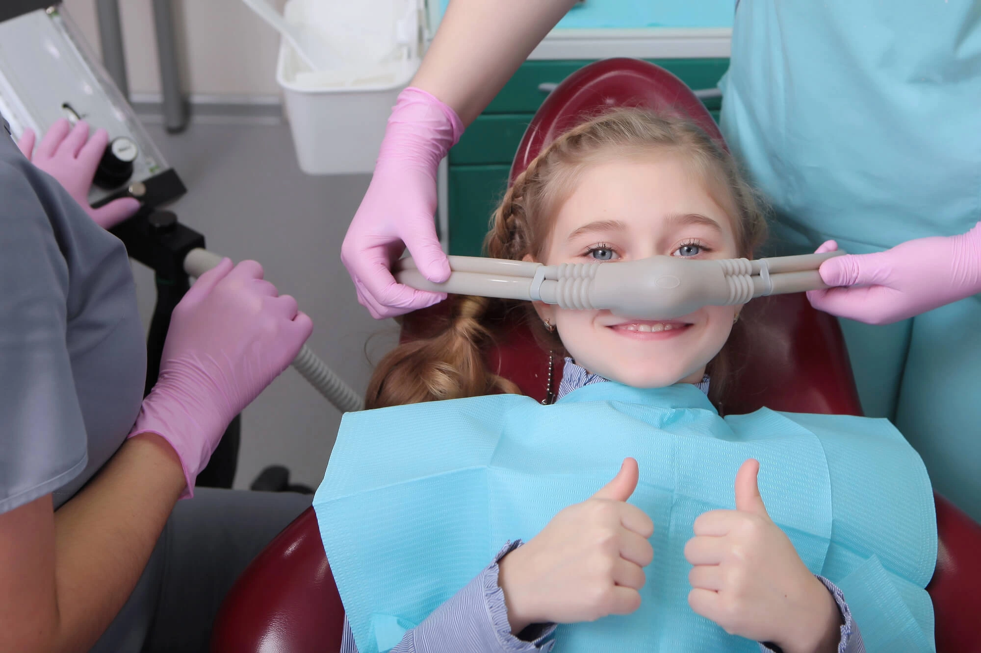 Child smiling after sedation dentistry sterling va