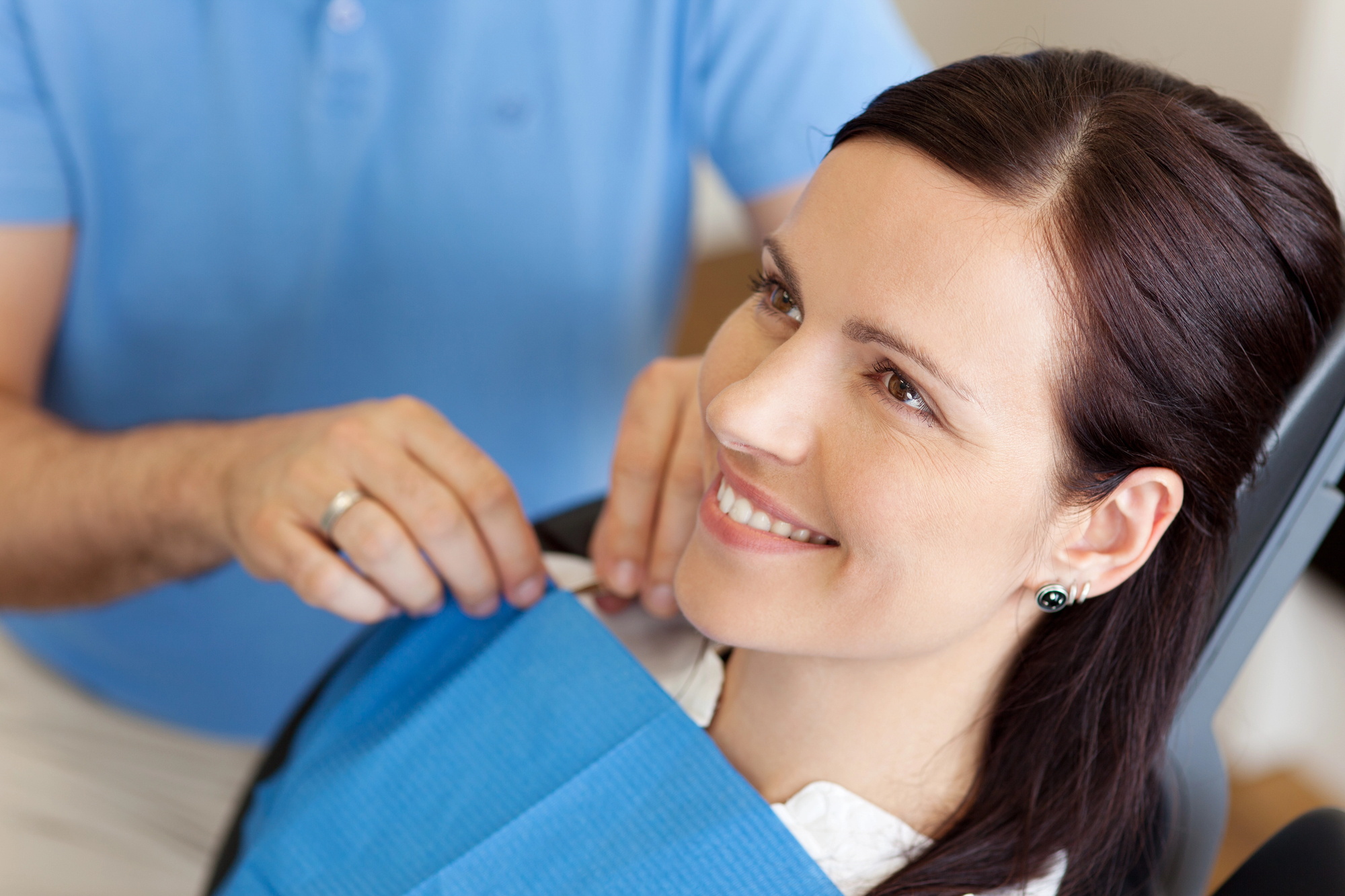 woman smiling during visit at the Fairfax TMJ dentist