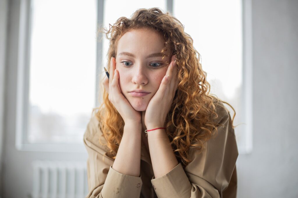 stressed woman trying to learn HTML