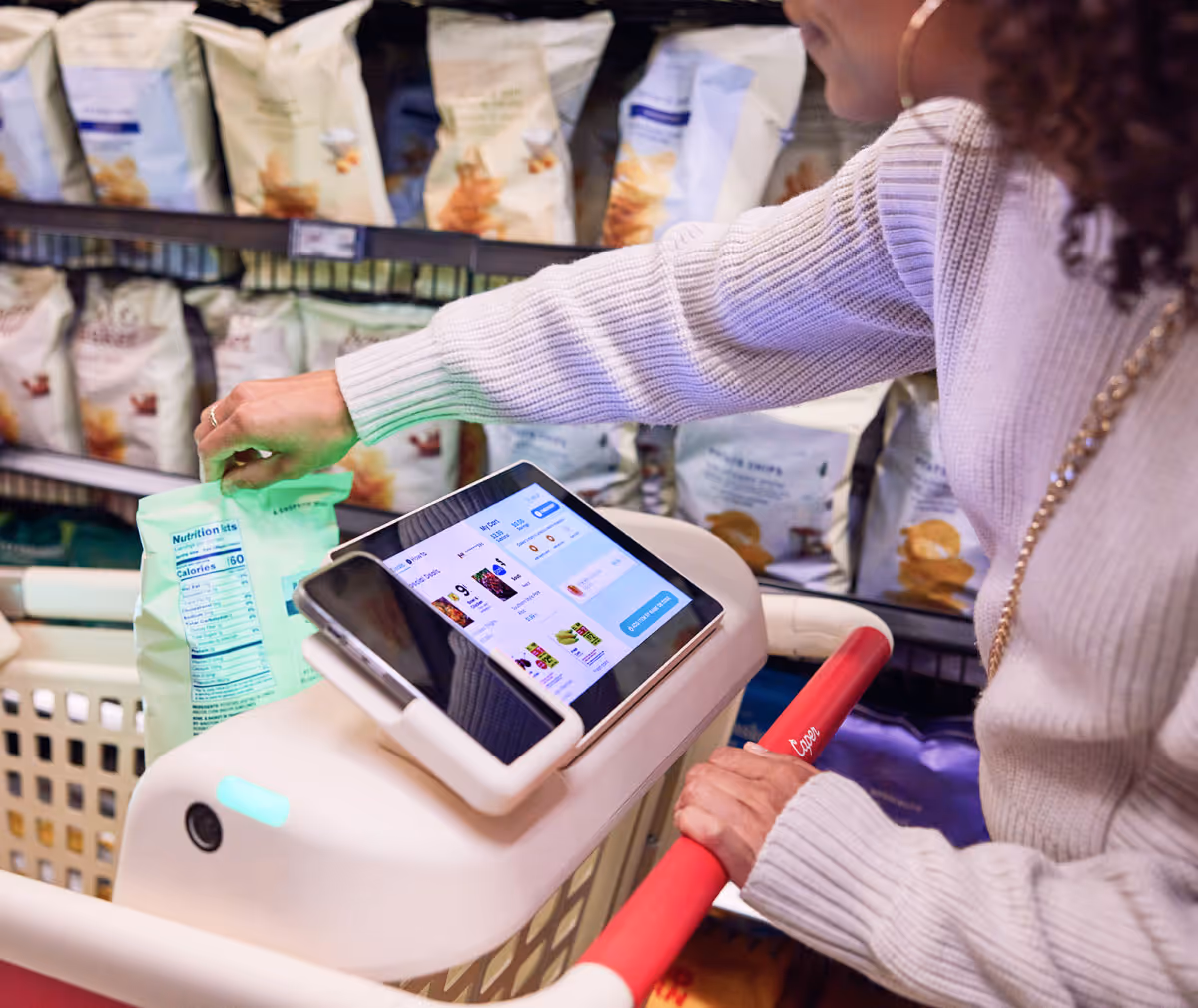Woman using Caper Cart Smart Cart