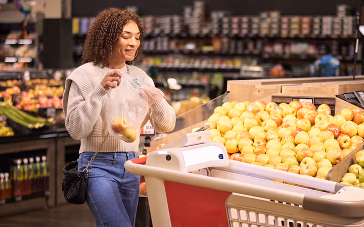 A customer shopping with Caper Cart