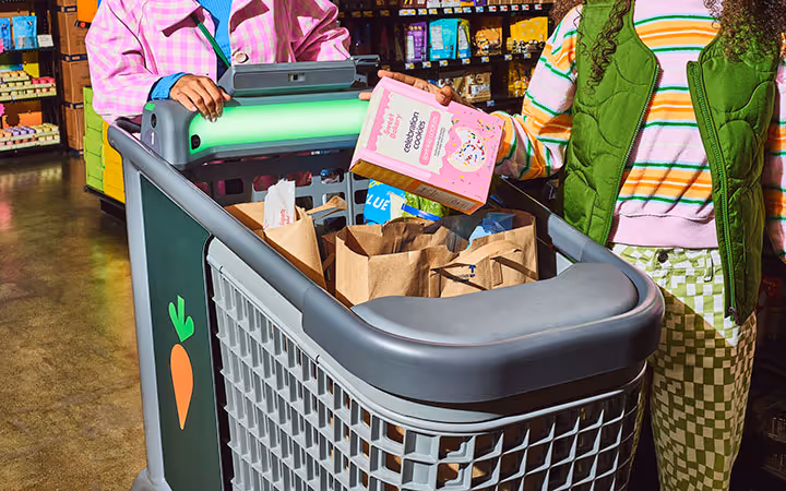 Customers shopping with Caper Cart