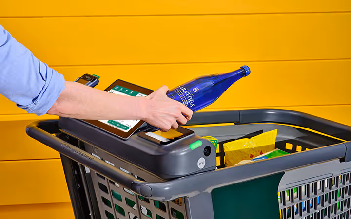 Customer shopping with Caper Cart