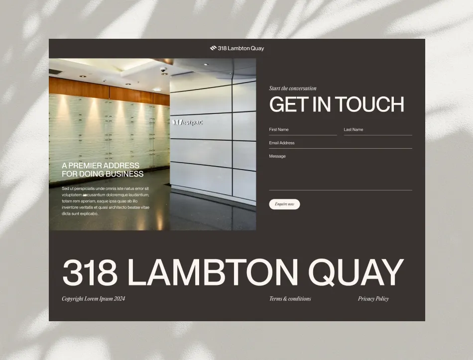 Modern building directory or wayfinding display showing "318 LAMBTON QUAY" with "GET IN TOUCH" button, mounted on white tiled wall