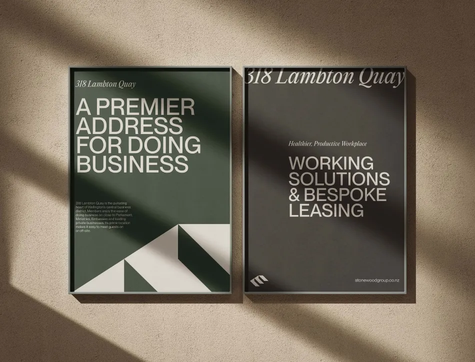 Three black business brochures or booklets with white text reading "MR LANDLORD CLUB," "A PREMIER ADDRESS FOR DOING BUSINESS," and "WORKING SOLUTIONS FOR LEASING" arranged on a beige surface