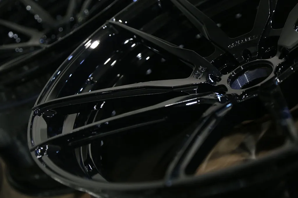 Powder coated wheel by Lux Auto Lab