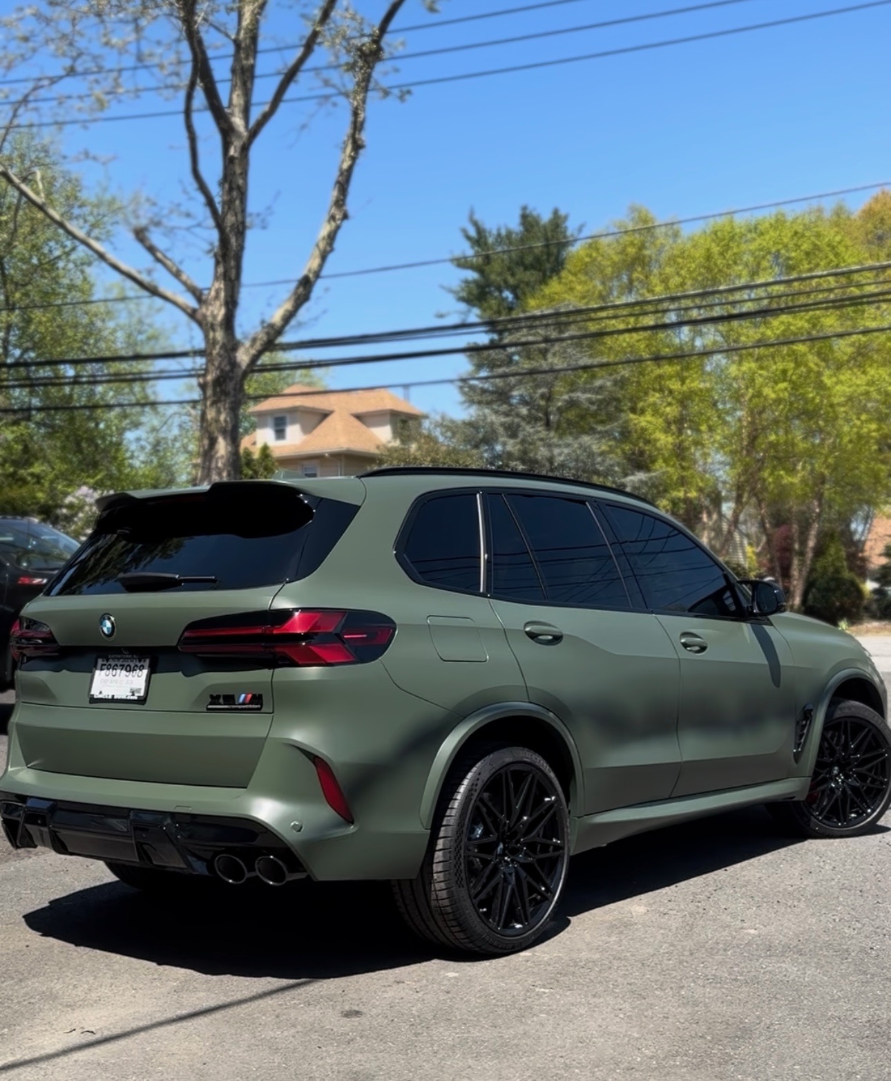 BMW X5 M with matte olive green vinyl wrap by Lux Auto Lab
