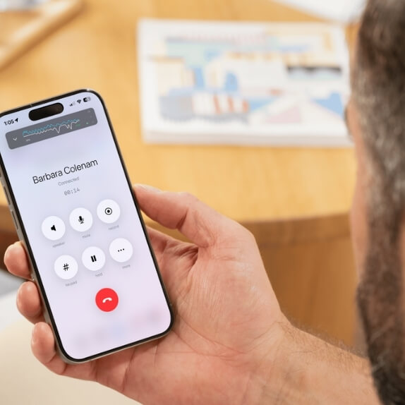 Employee making a business call through the Vodia mobile app