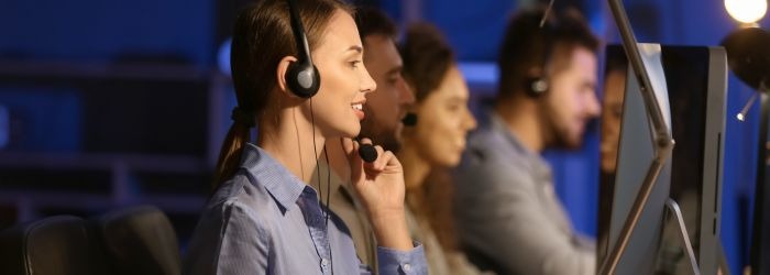 Happy call center employees with Vodia System