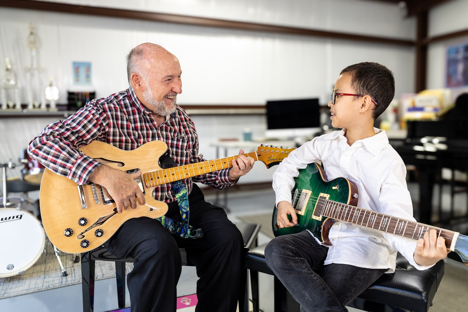 Guitar student taking lessons at Benbrook Music Academy near Fort Worth and Benbrook, Texas