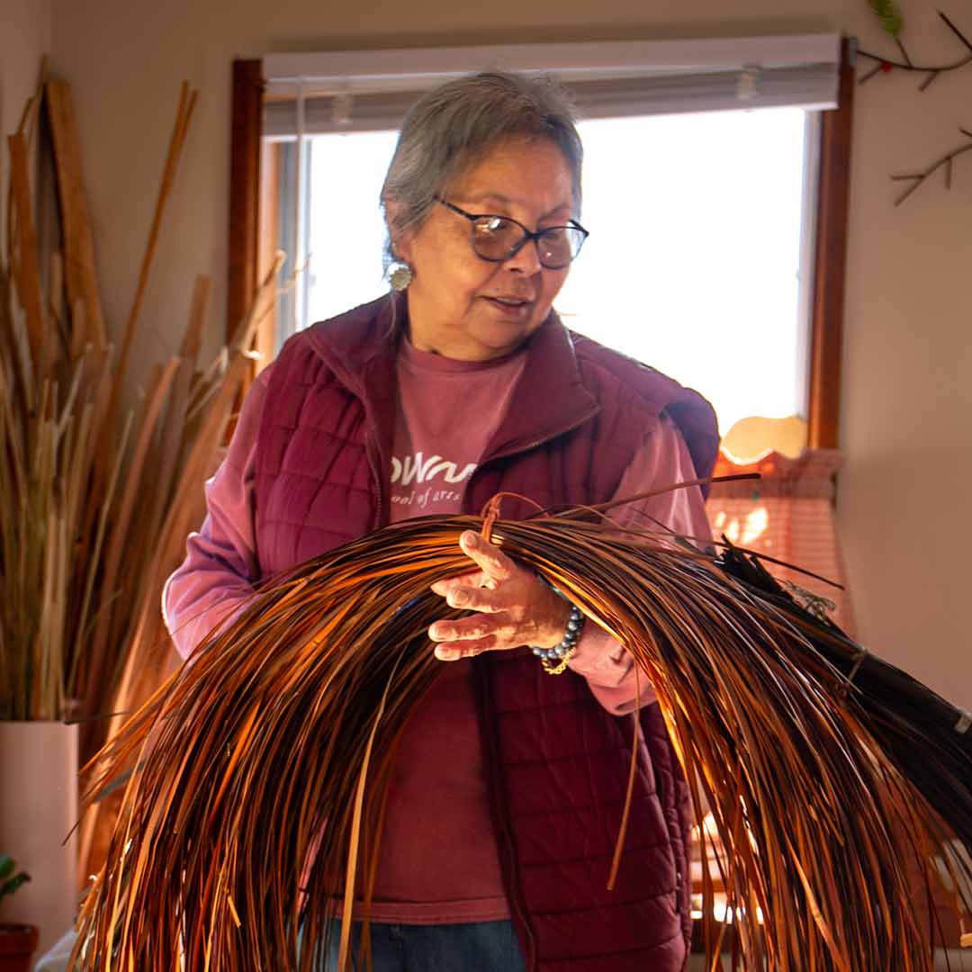 a portrait of an artist collecting materials