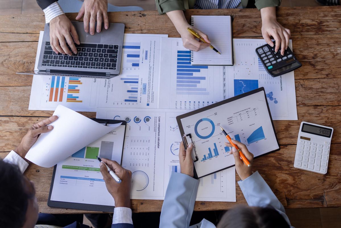 Small business team reducing stress with reliable outsourced bookkeeping and accounting solutions