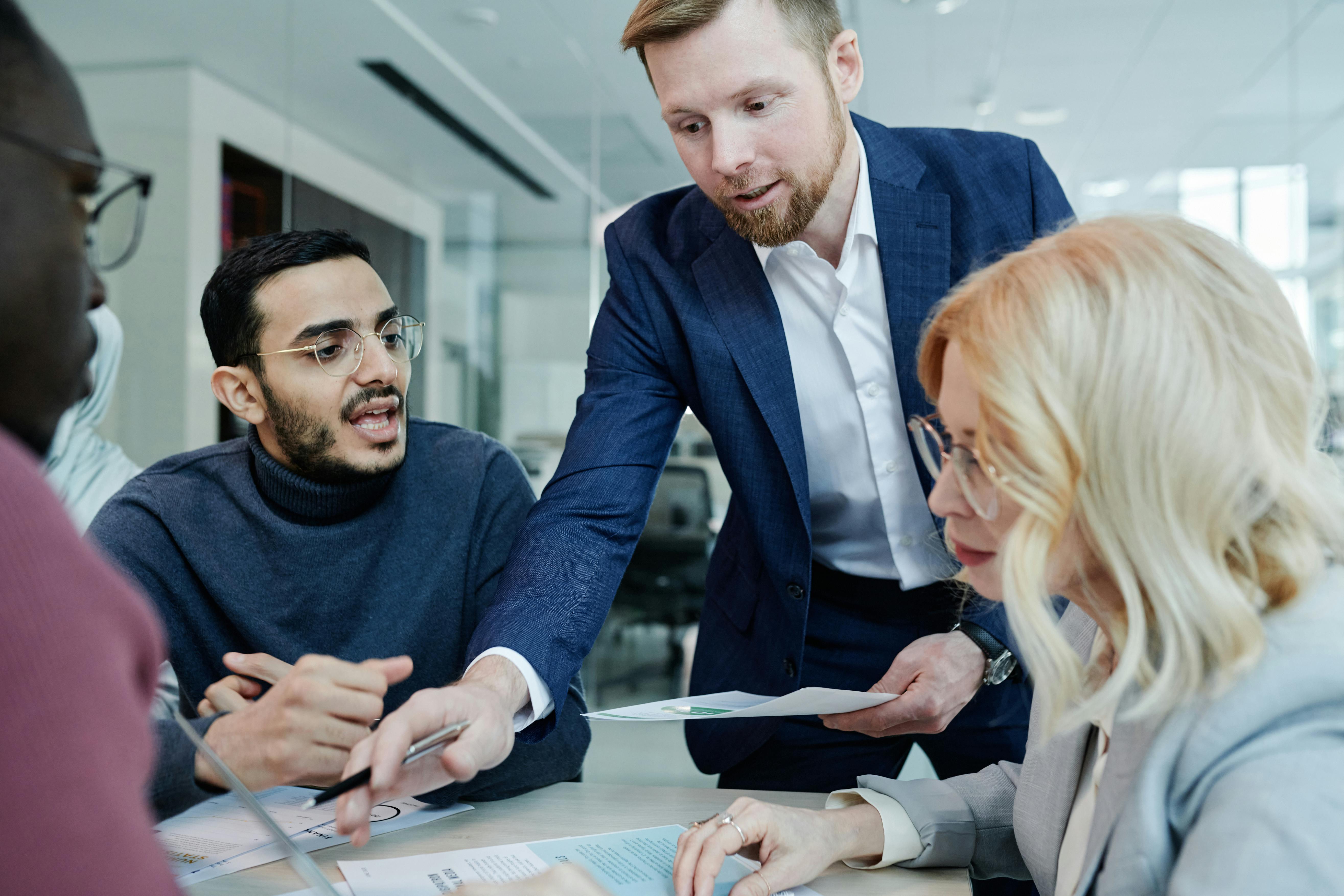 SMB founders collaborating with an outsourced Fractional CFO to improve financial planning and business scalability.