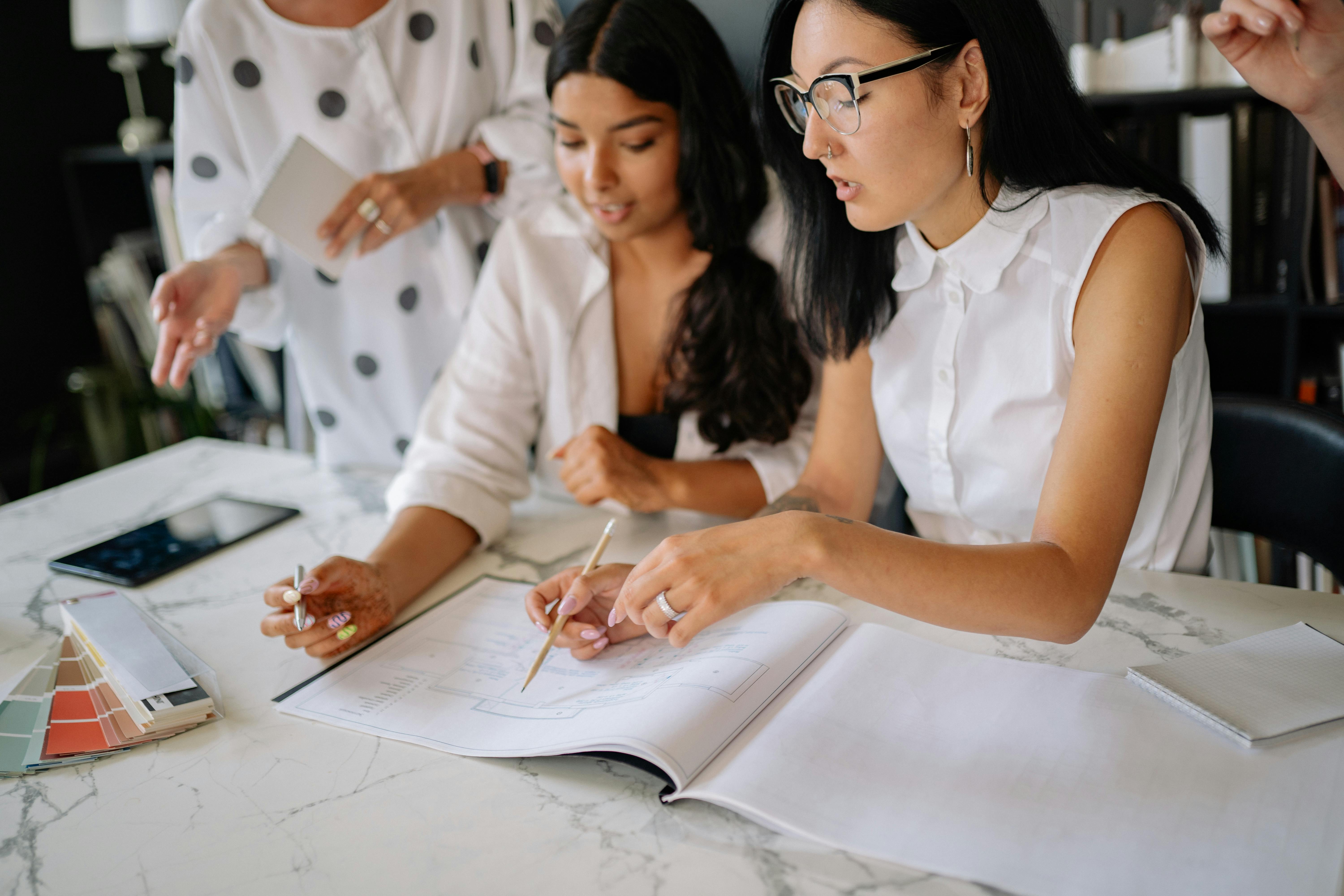 Small business owners in Canada outsourcing finance tasks to a trusted CPA firm.