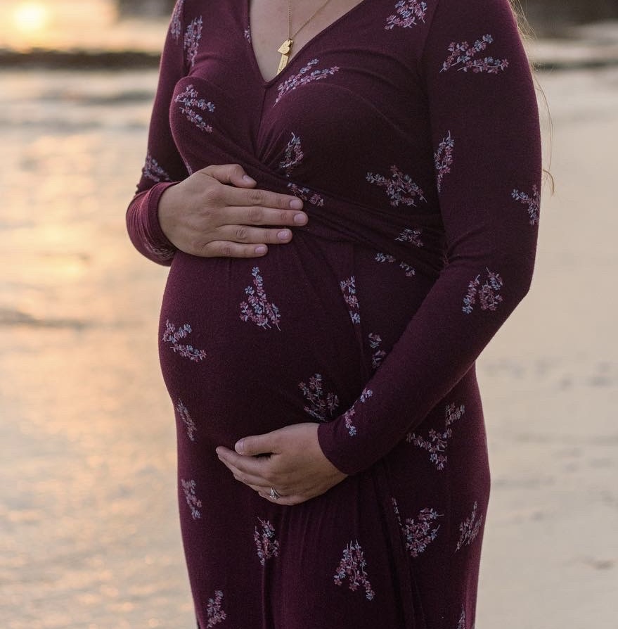 A photo of Sydney, Registered Nurse and Lactation Counselor, smiling