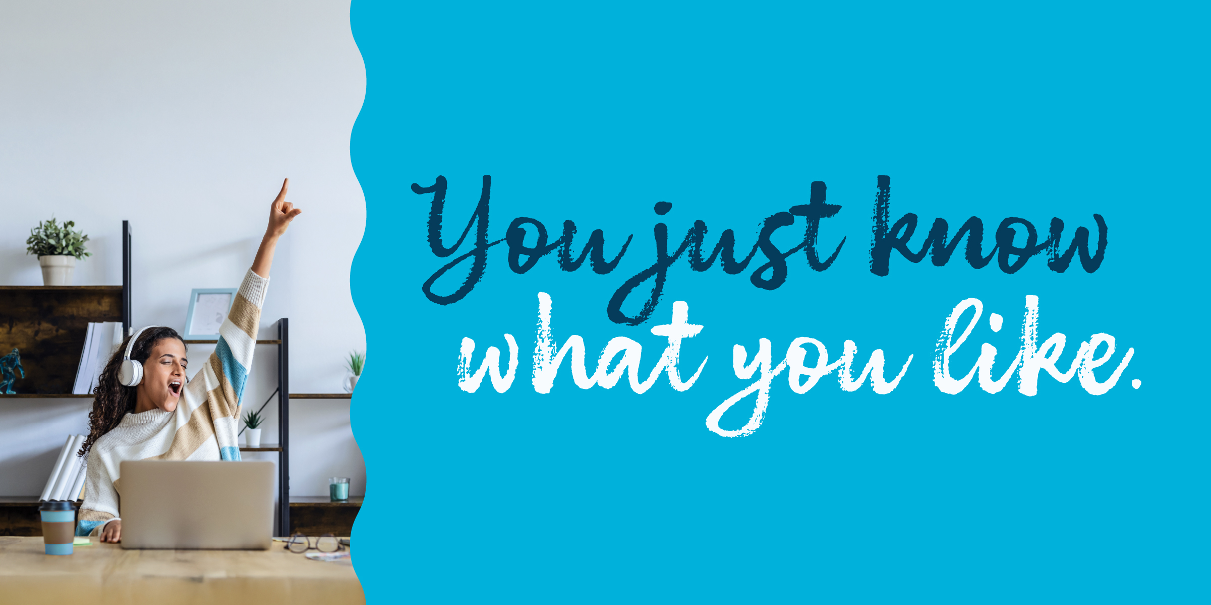 woman using a laptop using headphones jamming to some music