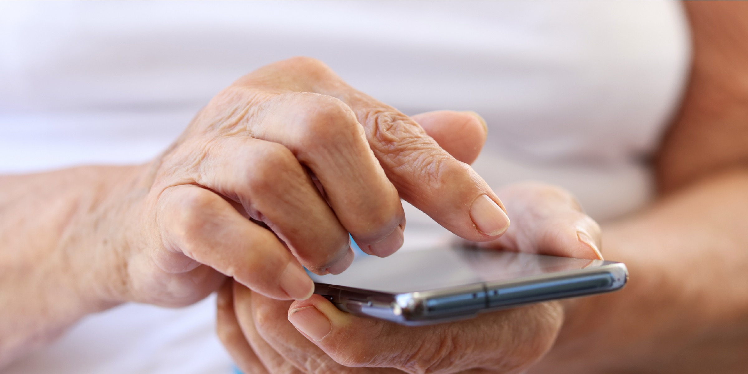 a close-up of a person using a smartphone