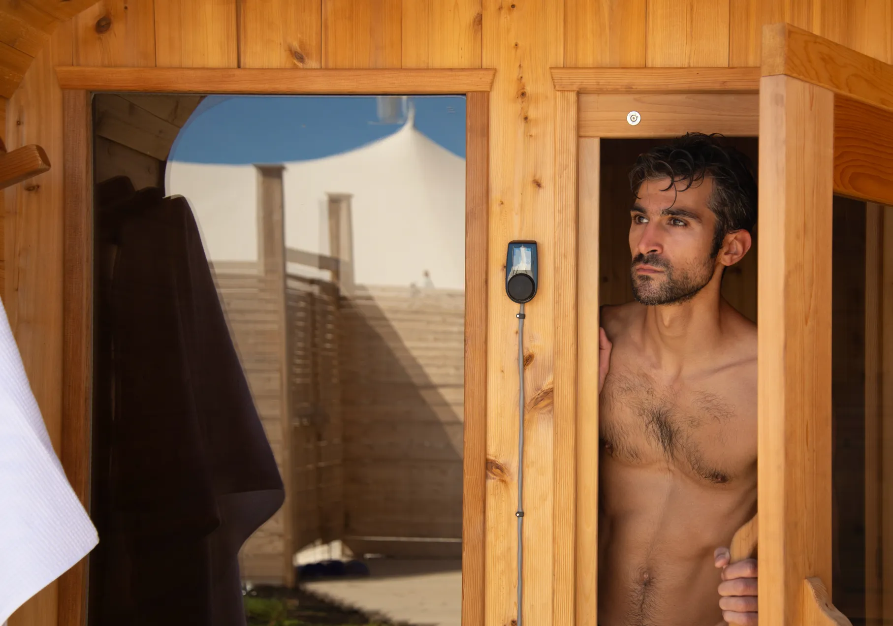 Man leaving sauna at The Viewpoint Hotel in York, Maine