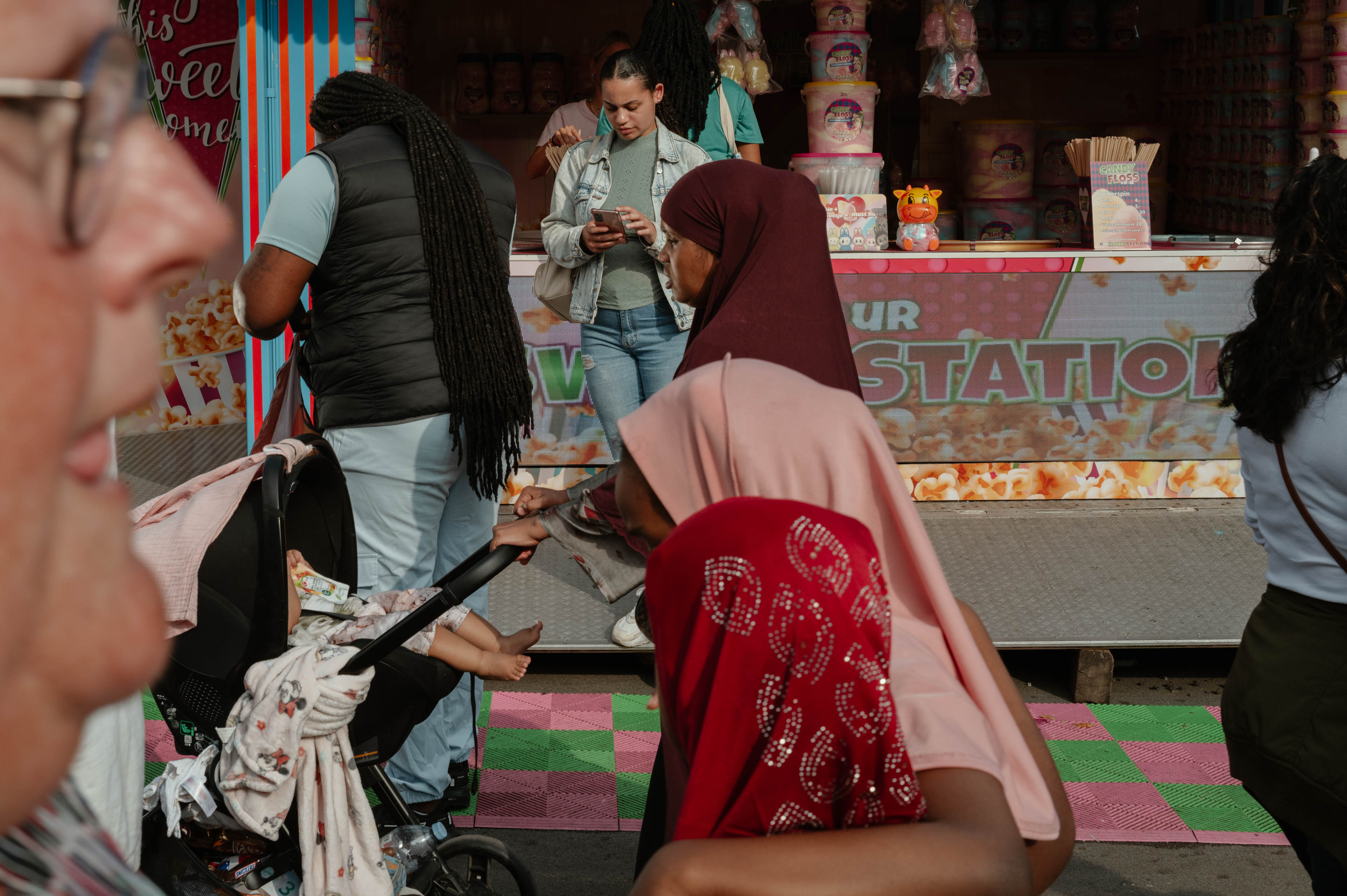 People on the fun fair in Tilburg Netherlands Tilburgse kermis straatfotografie