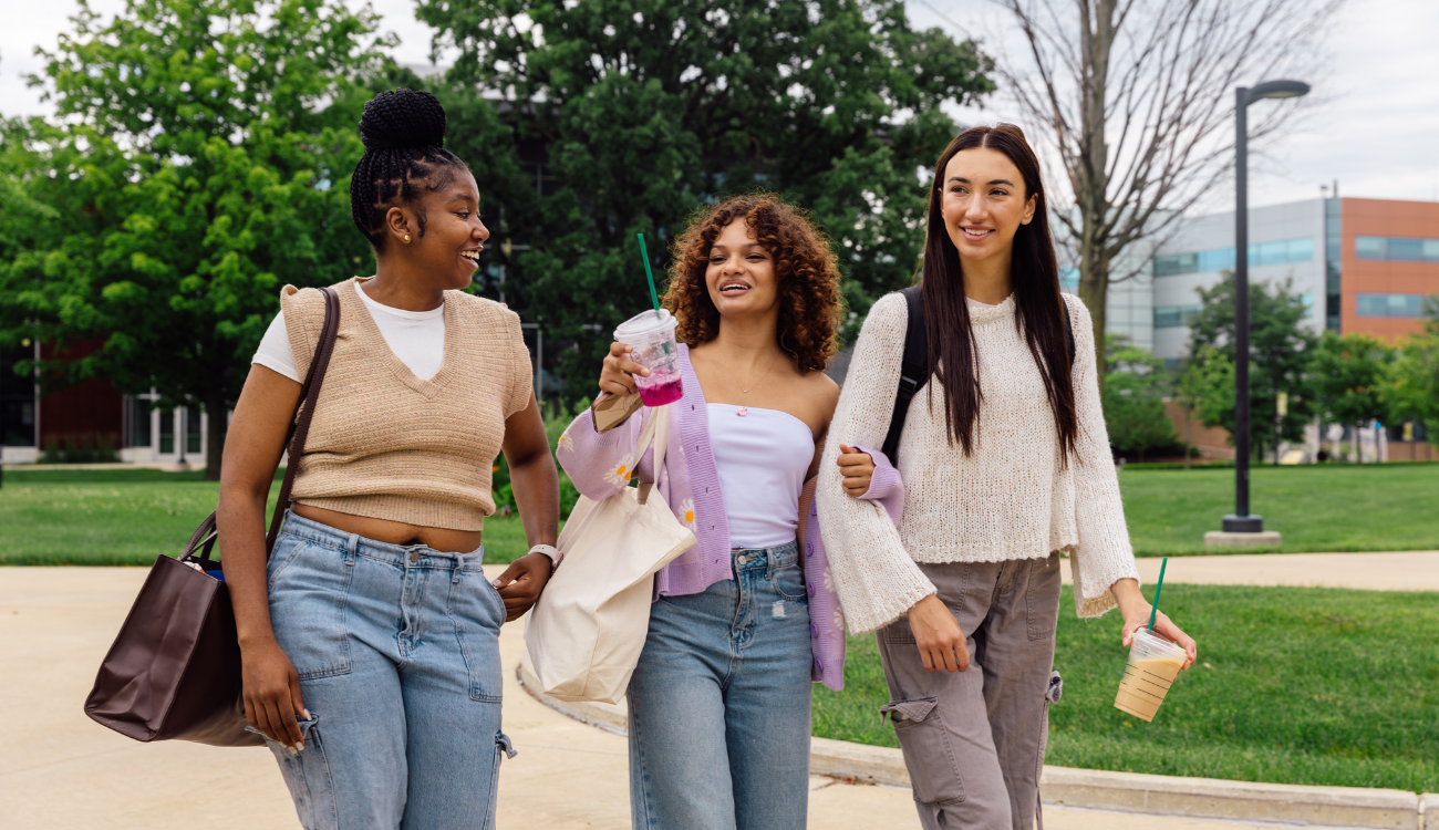 young girls walking on campus