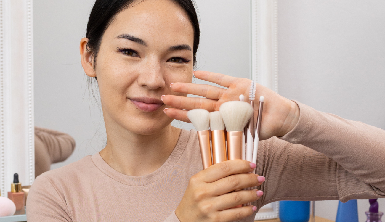 girl putting make up on
