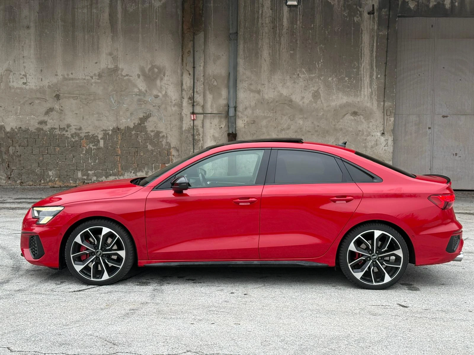 Side profile of the Audi S3 on the asphalt, ready for rental