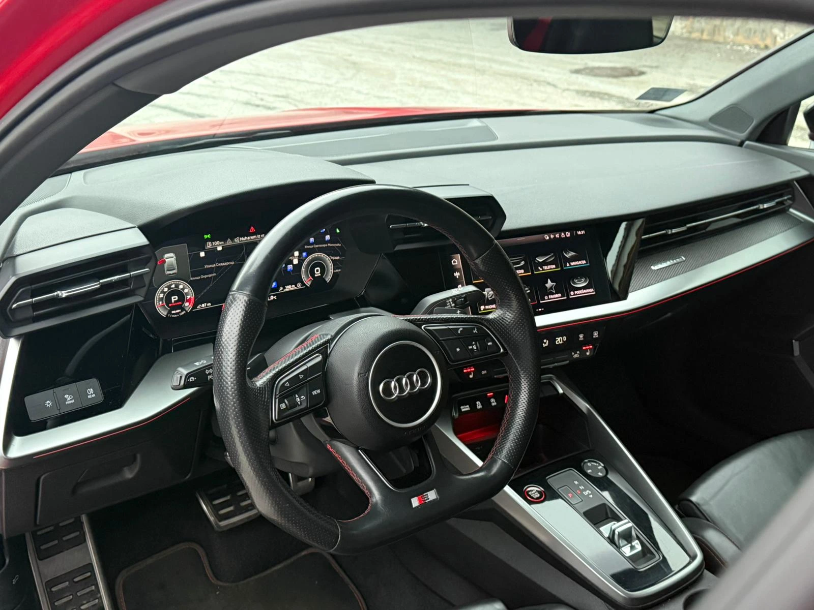 Interior of the Audi S3 with natural light showing the driver’s cockpit