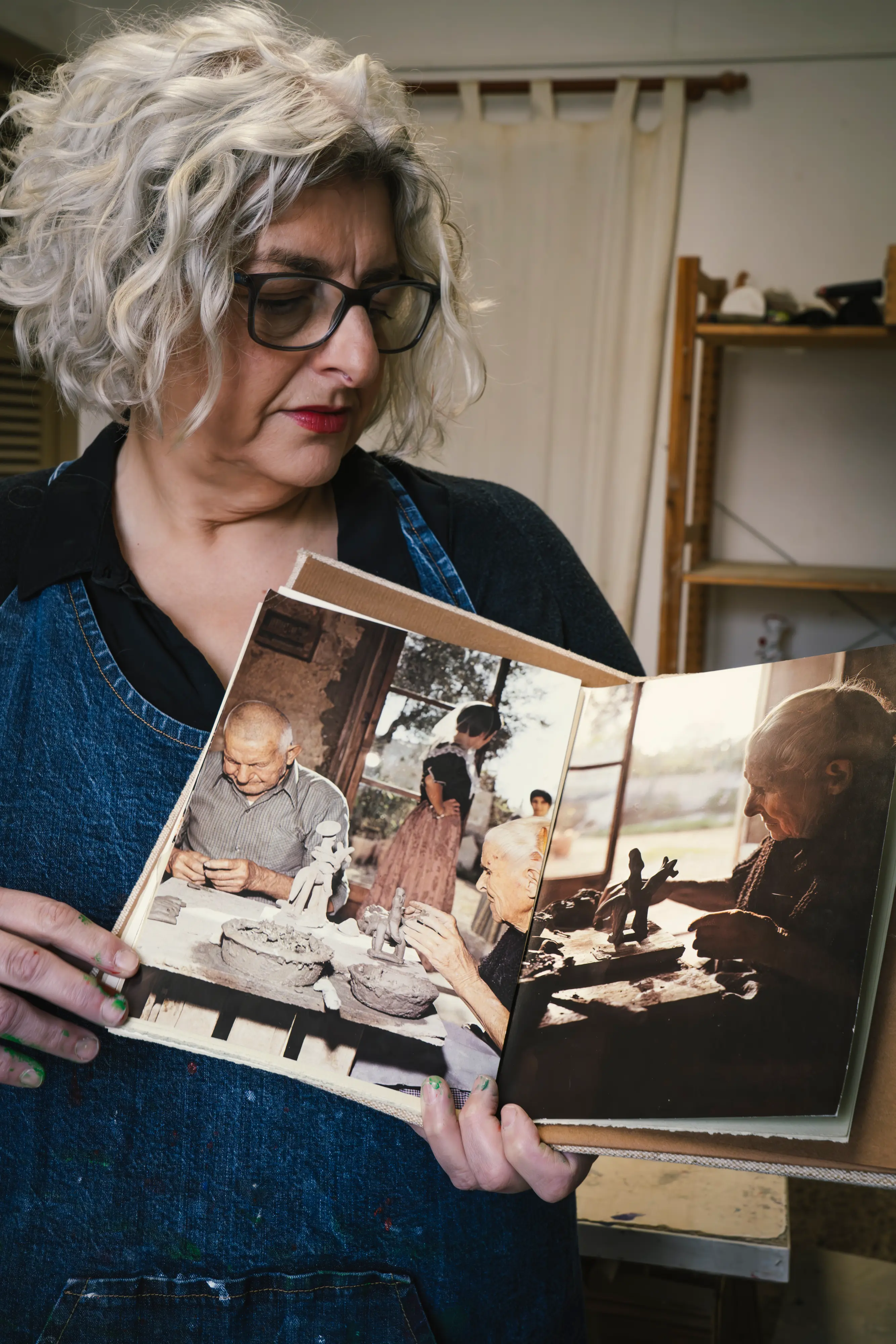 Coloma María Cañellas Palou with a photo of her grandparents. Photo: Duncan Kendall
