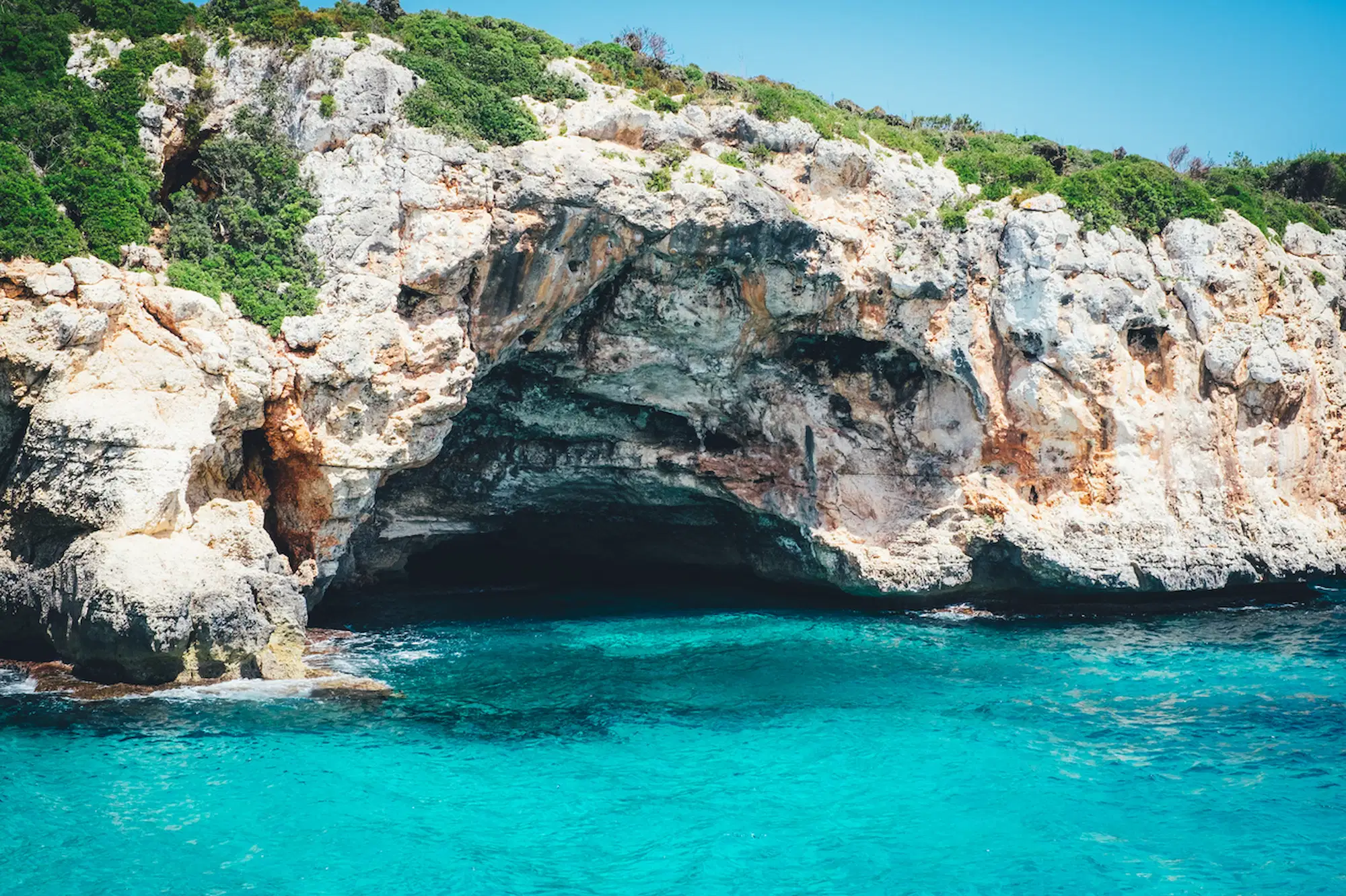 Cala Varques rocky cave and turquoise water