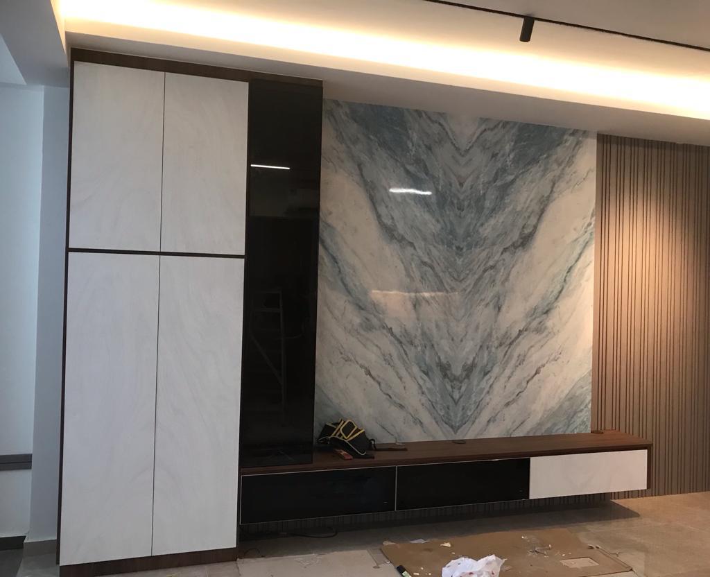 Marble finish wall feature with dark wooden tv console and white cabinet
