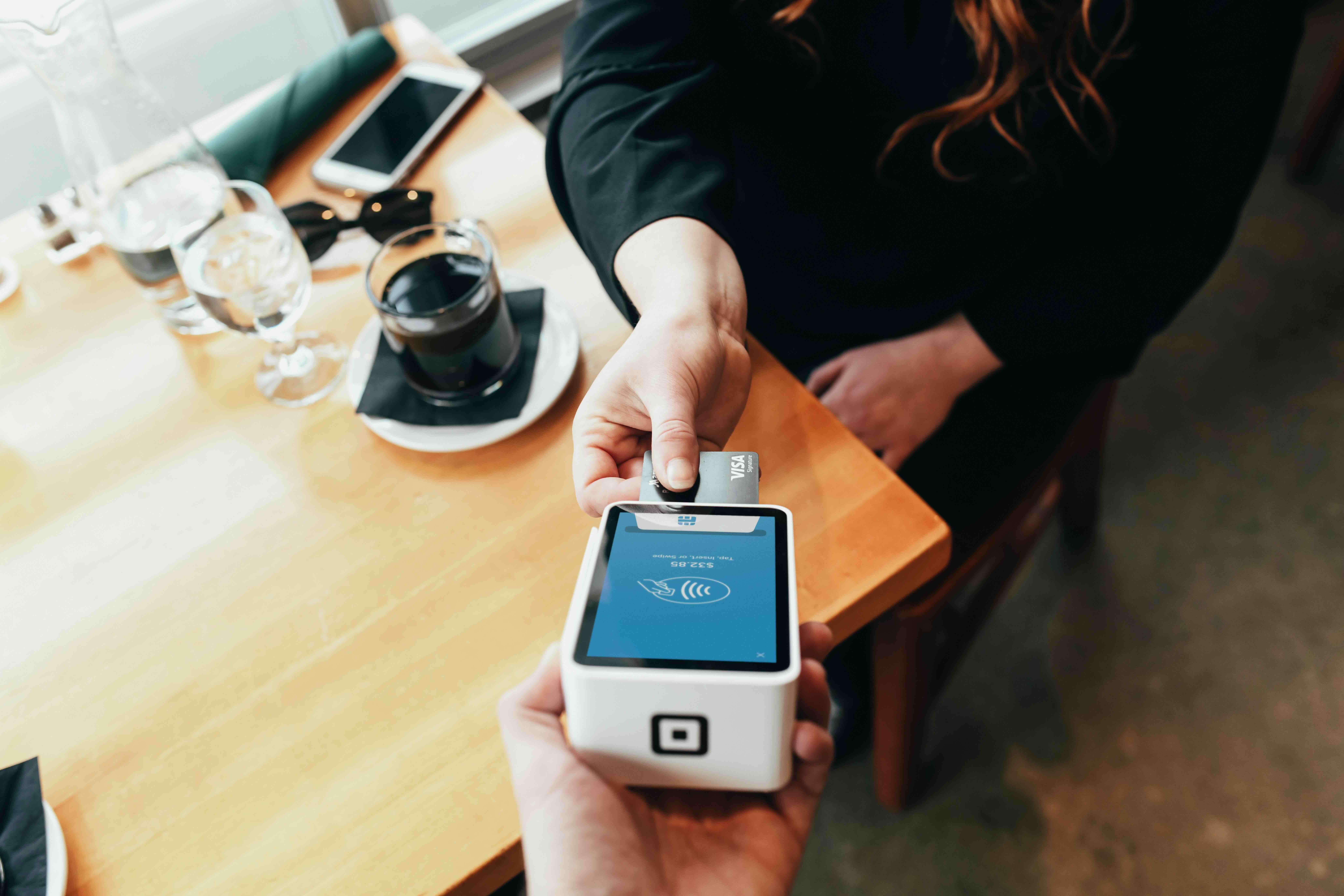 woman buying a coffee