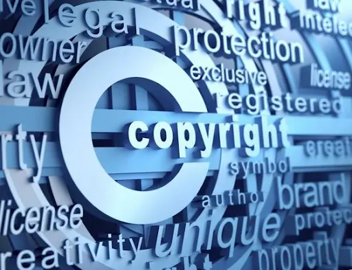 3D copyright symbol surrounded by intellectual property legal terms illustrating software copyright protection - Legalfinda