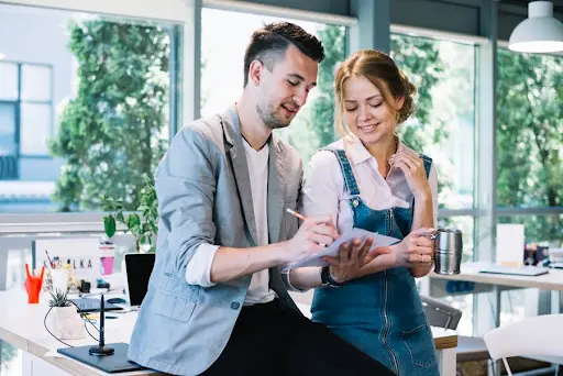 Employer reviewing employment contract and casual conversion rights with female employee in Perth workplace - Legalfinda