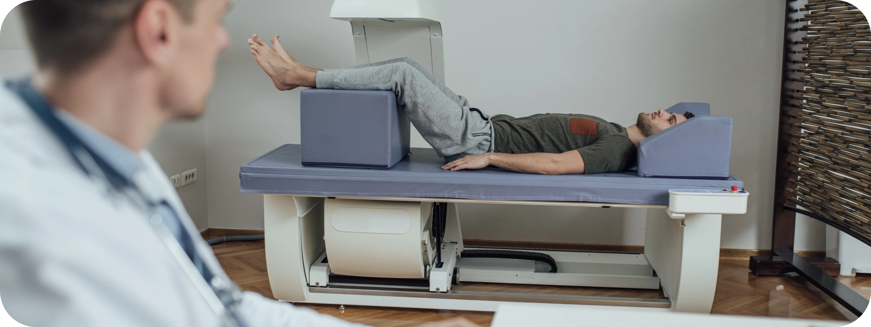 Patient lying on a DEXA bone density scanner