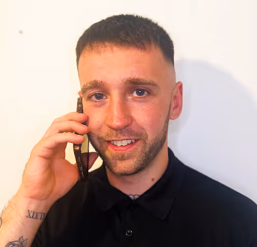 Sean on the phone, photo