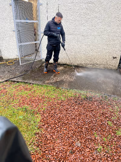 Sean jet washing patio, photo