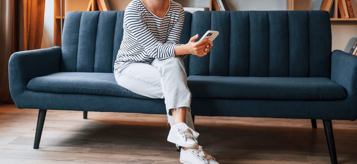 lady sitting on a sofa, photo