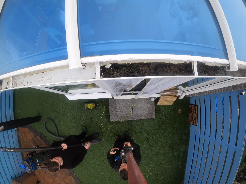 gutter cleaning in progress