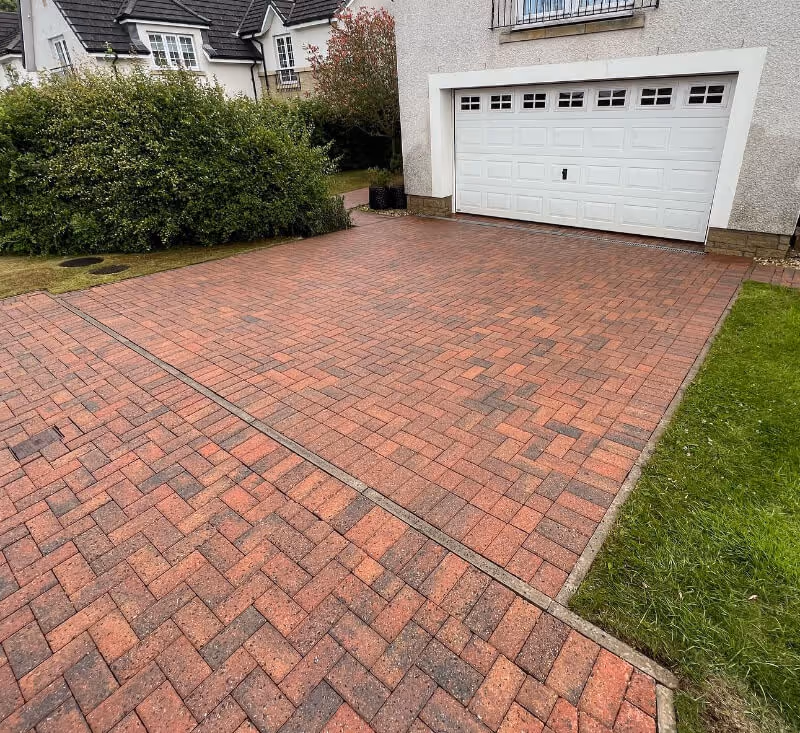 photo showing just cleaned driveway