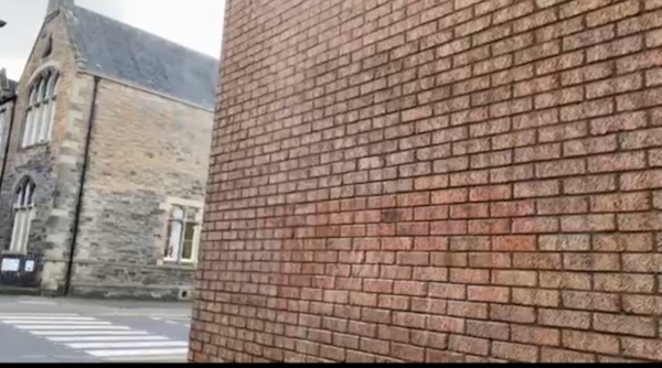 Wall after graffiti removal
