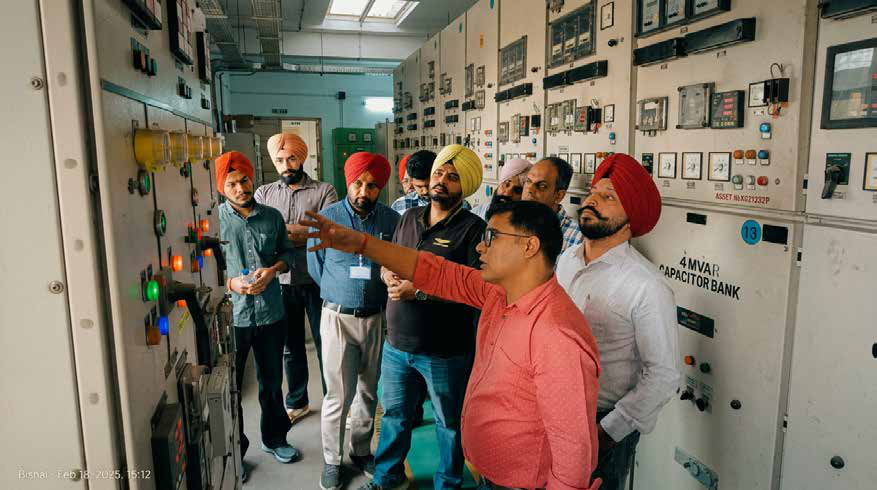AIPM trainees observing switchgear and a capacitor bank during a plant visit