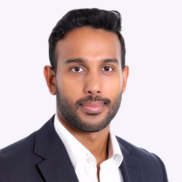Headshot of Travolta Mohan, VP, Group Treasurer at Mangopay