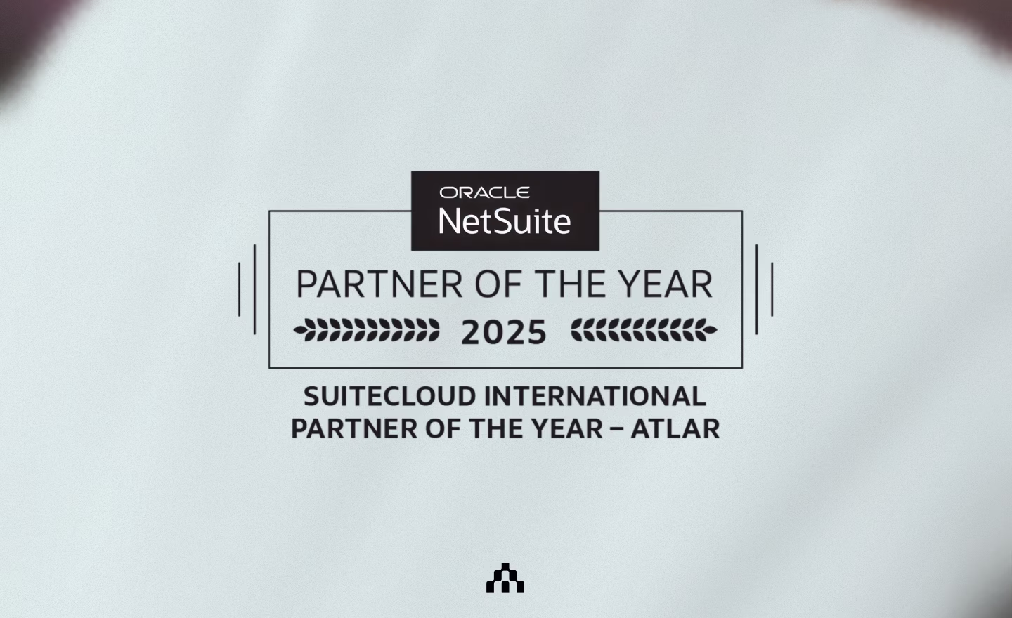 Oracle NetSuite SuiteCloud International Partner of the Year 2025 award graphic naming Atlar, with the Atlar logo below
