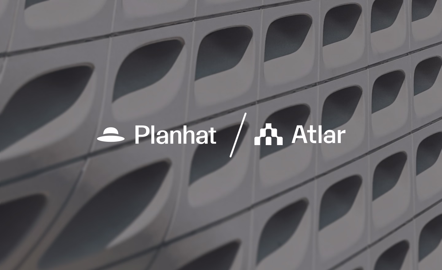 Planhat and Atlar logos side by side over a photo of a building facade, announcing the partnership