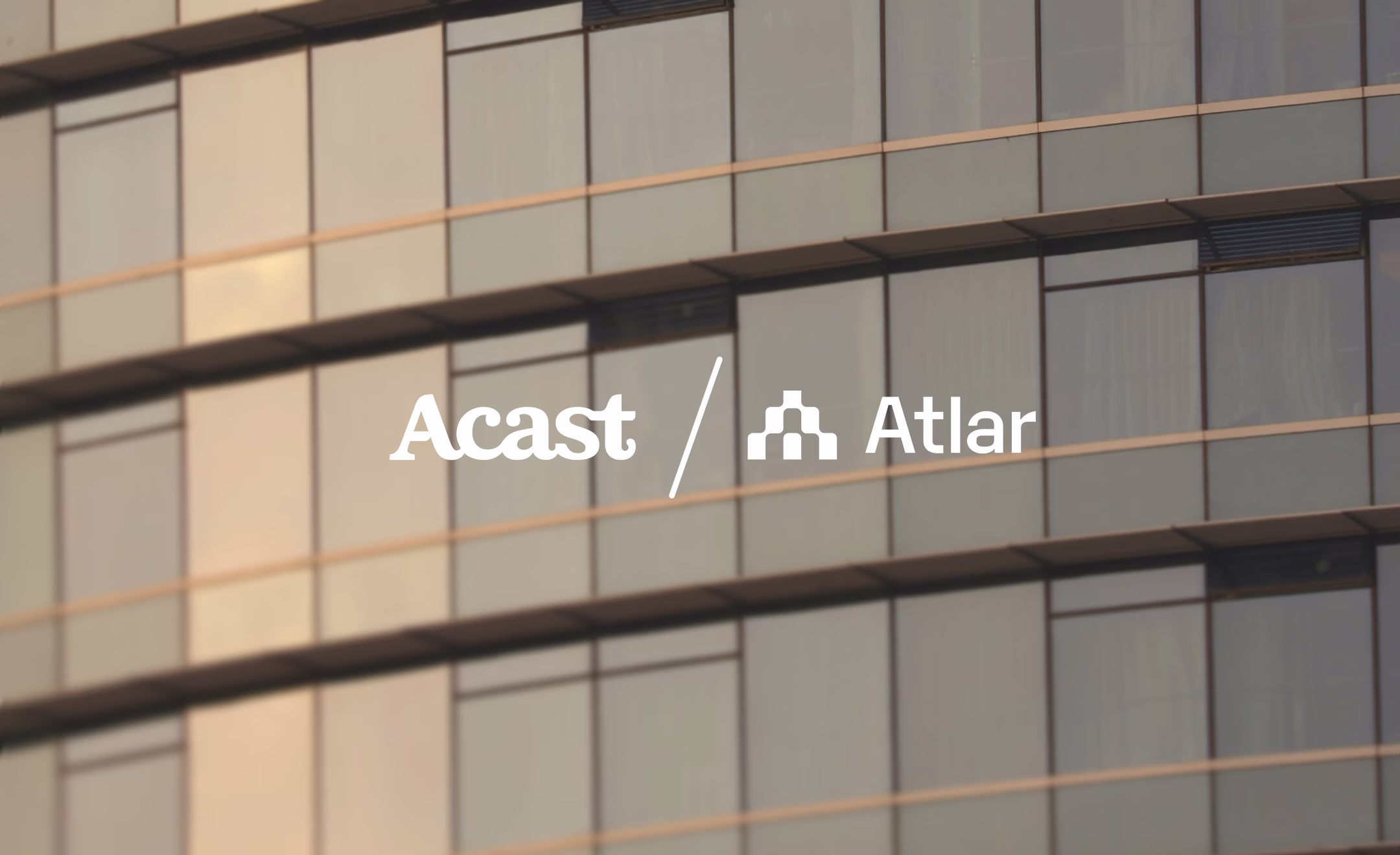 Acast and Atlar logos side by side over a photo of a building facade, announcing the partnership