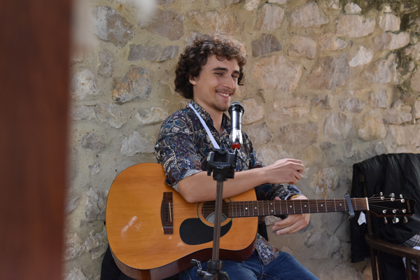 Pietro Maggio playing music in event