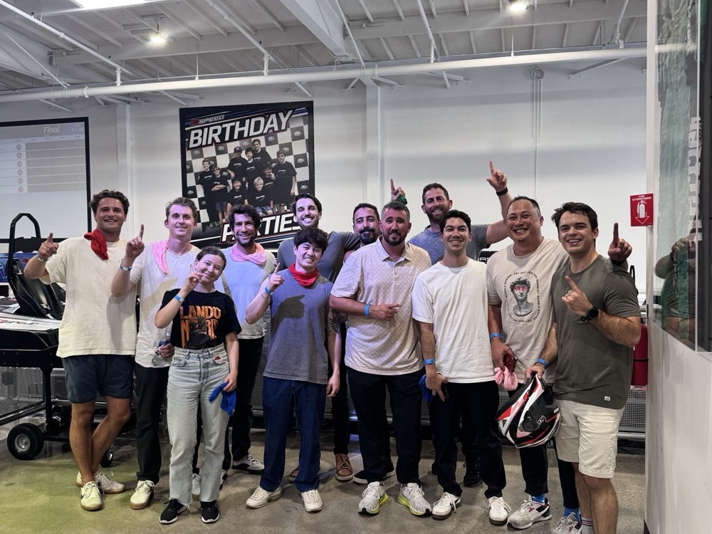 The team celebrating in the office