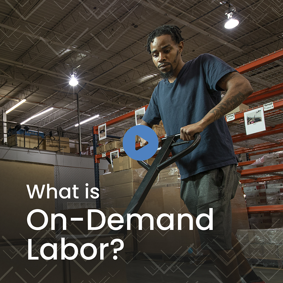 warehouse worker holding crate of beer in distribution center